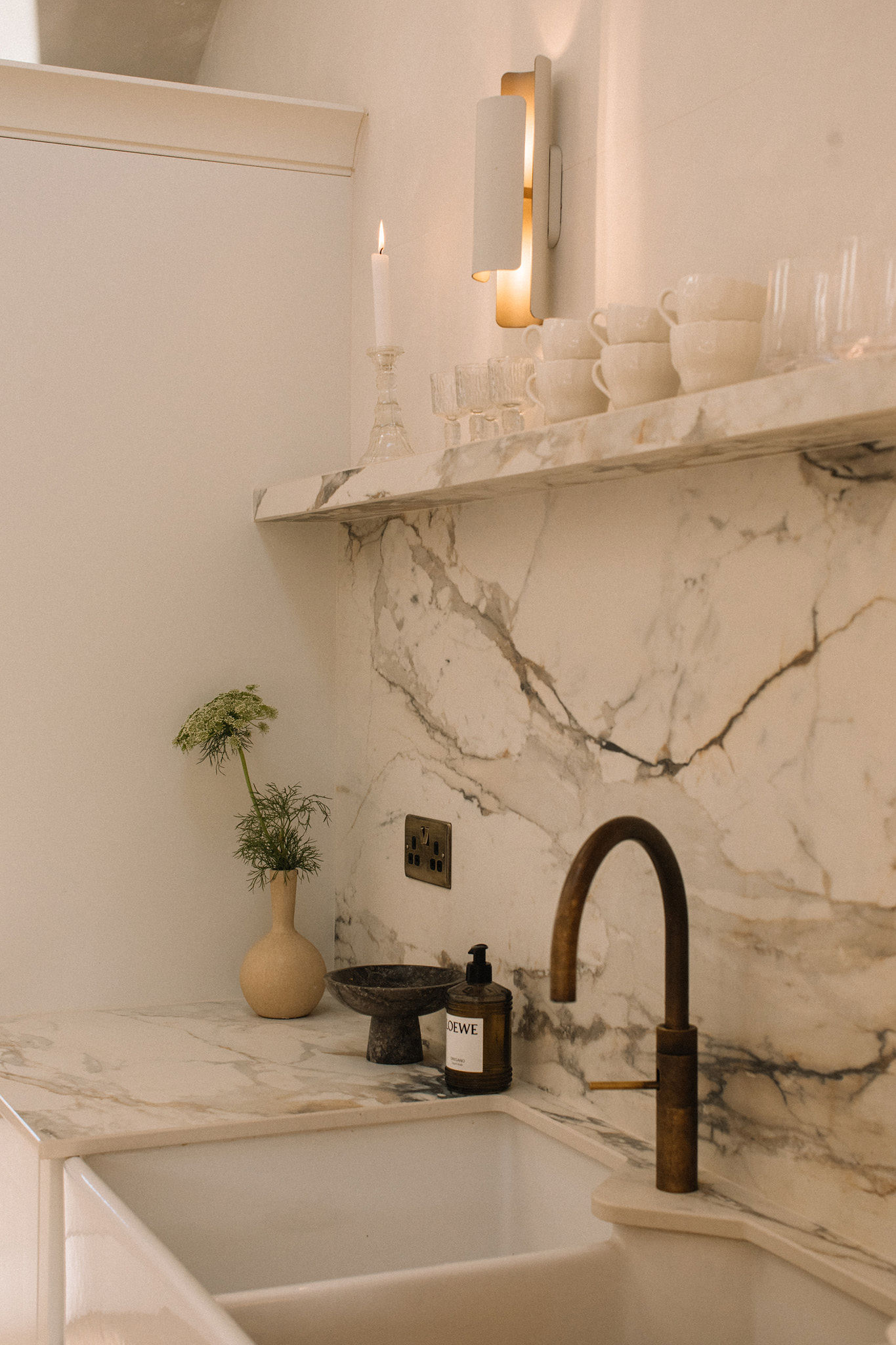 Gemma Lomas-Jones styling a kitchen cabinet